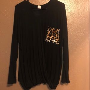 black long sleeved top with leopard pocket